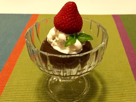 vegan espresso jello dessert with coconutMilk whippedCream & an organic strawberry