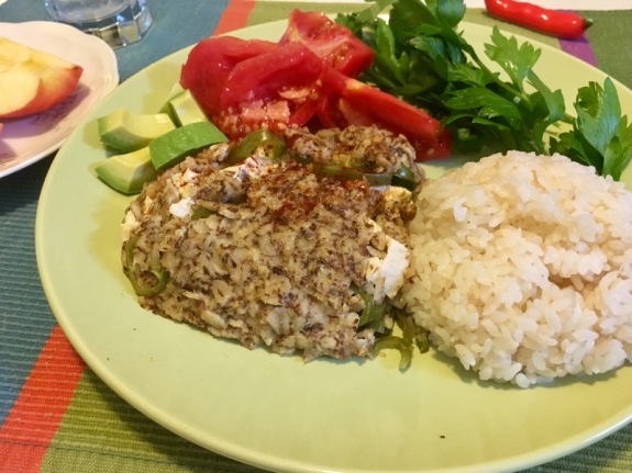 oatmealette with rice, tomato, avocado, & parsley